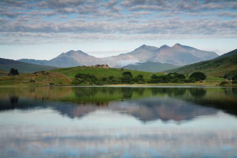 Snowdon mountain range reflecting in lake